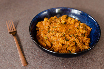healthy plant-based food, lentil and tomato sauce pasta