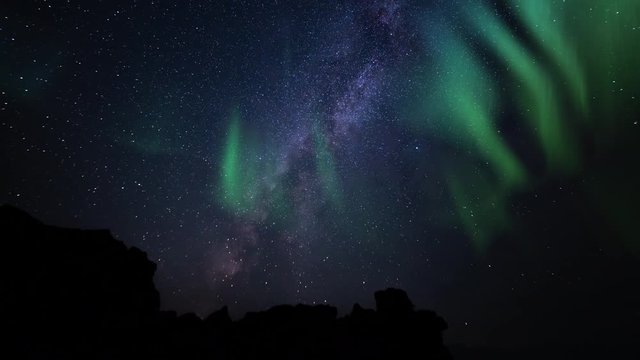 Aurora Borealis Milky Way Over Volcanic Rocks Time Lapse Simulated Northern Lights
