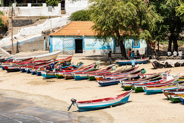 Colorful traditional wooden fishing boats on the beach of Tarrafal in Cape Verde