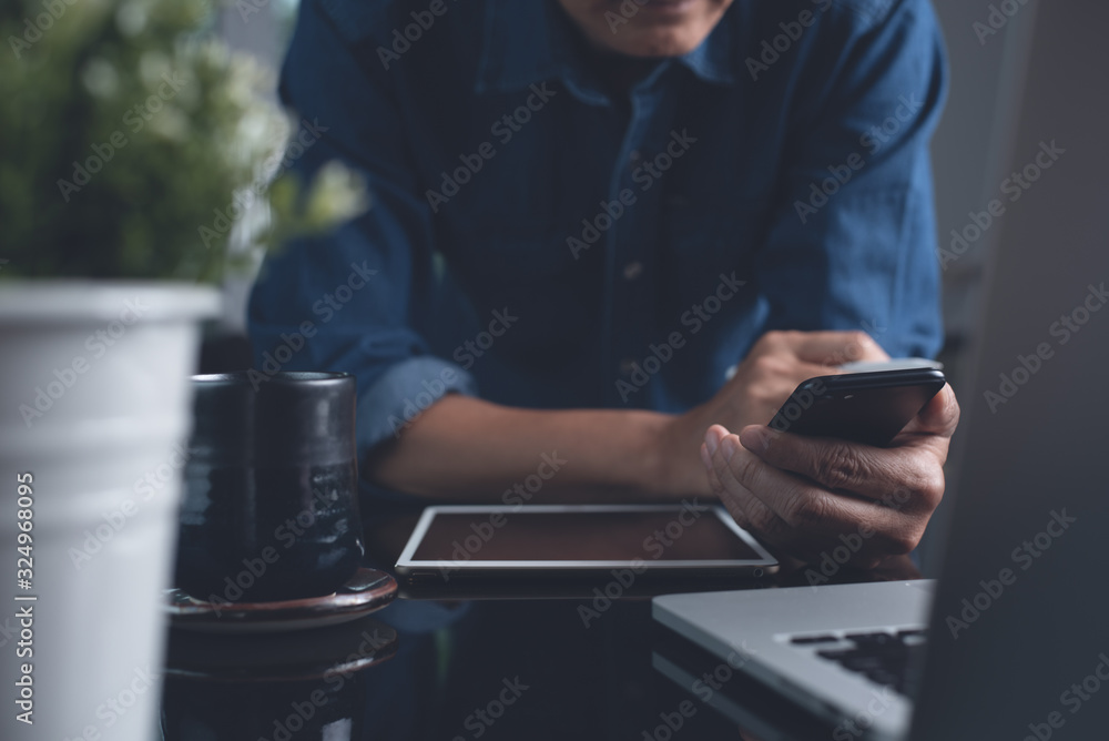 Poster multitasking businessman working on computer devices