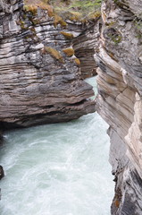 Water running through rock mountain