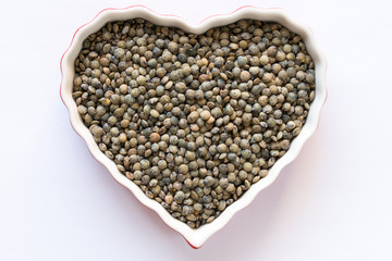 Uncooked French Green Lentils in a Heart Shape