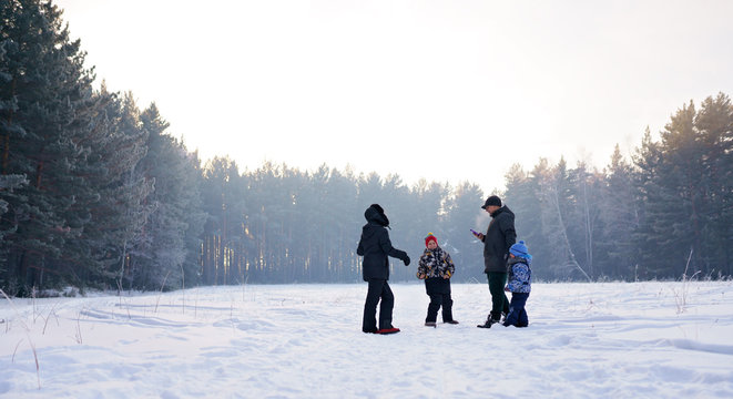 Family In The Snow