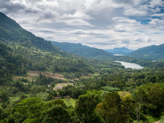 Fototapeta na wymiar Amazing landscape of valley with jungle forest and lakes between two high mountains on Sri Lanka