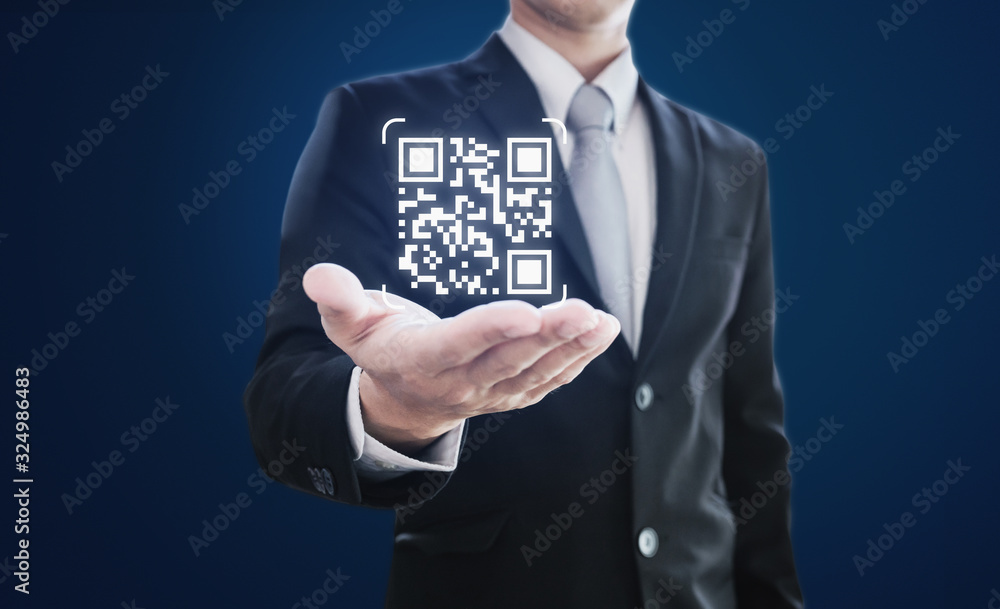 Poster businessman holding qr code on hand. qr code scanning payment and verification technology