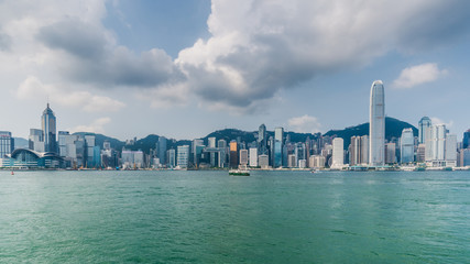 Panoramic banner cover of Hong kong city view from Victoria harbour, travel concept background.