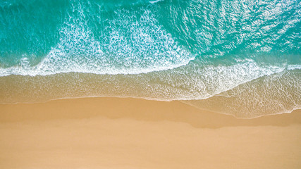 Fototapeta na wymiar Top view aerial image from drone of an stunning beautiful sea landscape beach with turquoise water with copy space for your text.Beautiful Sand beach with turquoise water,aerial UAV drone shot