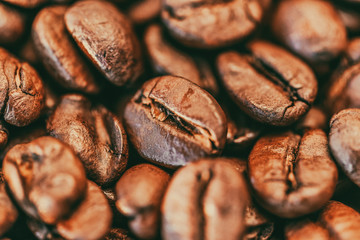 Coffee beans background texture closeup.