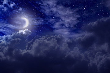 Stars,  moon and cumulonimbus in the night sky - 325003670