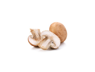 Brown champignon mushroom and rosemary leaves isolated on white background