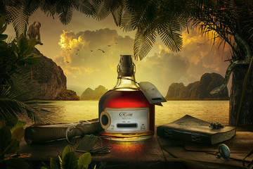 NO LOGO OR TRADEMARK!  view of bottle of rum  on sunset background.  - obrazy, fototapety, plakaty