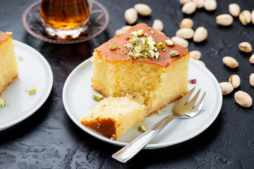 Revani - sweet semolina cake with pistachio, traditional turkish dessert