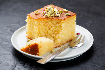 Revani - sweet semolina cake with pistachio, traditional turkish dessert