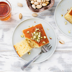 Revani - sweet semolina cake with pistachio, traditional turkish dessert