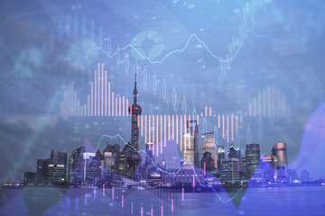 Forex chart on cityscape with tall buildings background multi exposure. Financial research concept.