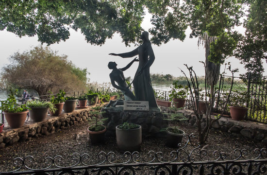 Tabgha. Israel. January 27, 2020:   Bronze statue standing in the courtyard of the Church of the Primacy of St. Peter, located on the shores of the Sea of Galilee in Tabgha, Israel.