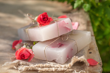 Moisture cubes of rose soap in summer garden