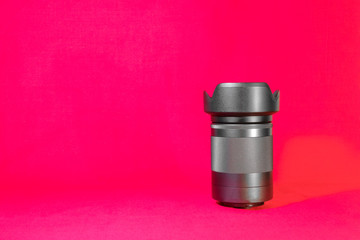 camera lens on a red background