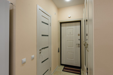View of the hallway, water door and bathroom door