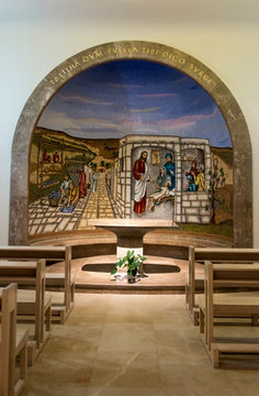 Magdala, Israel, January 26, 2020: Side altar in the church in Magdala on the Galilee Lake (Tiberiacn) with a mosaic depicting Jesus resurrects Jair's daughter