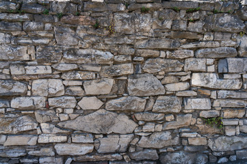 Stone wall texture background. Grey slate rock texture