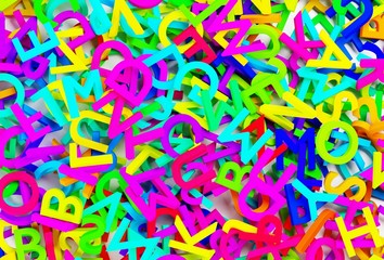 Heap of multi color alphabetic character letters texture background flat lay top view from above, literature, education, know-how or writing concept
