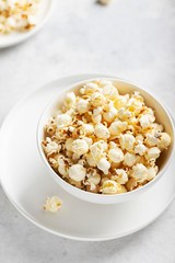 Salt popcorn in the light bowl