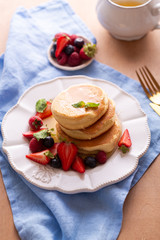 Trendy homemade japanese pancakes for breakfast with berries
