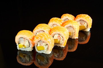 Philadelphia roll sushi with salmon, avocado, cream cheese. Japanese food