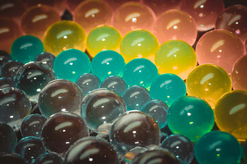 Rainbow. Game. Multicolored gel balls. Beautiful abstract bright geometric background full color. Concept of positive and joy