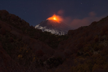 Naklejka na ściany i meble Strombolian activity on Mount Etna in a beautifull landscape