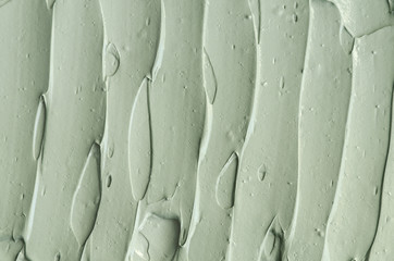 Gray bentonite facial clay (mask, face cream, body wrap) texture close up, selective focus....