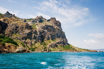 Fototapeta na wymiar Karadag mountain range in Crimean mountains, an ancient extinct volcano.