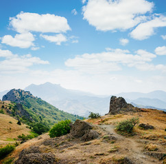 Fototapeta na wymiar Karadag mountain range in Crimean mountains, an ancient extinct volcano.
