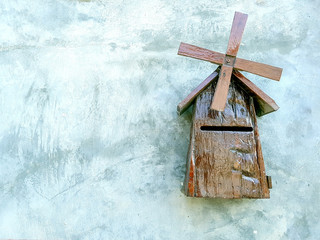 old wooden windmill in the snow