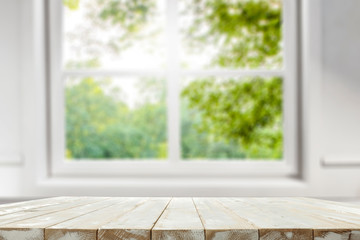 desk of free space and spring window background 