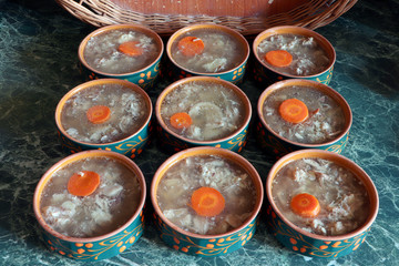 Jellied minced meat. Meat jelly on a table. Aspic of meat.