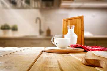 Fototapeta na wymiar Desk of free space and fresh cold milk on table 