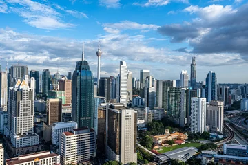 Gordijnen skyline van de stad in Kuala Lumpur © THINK b