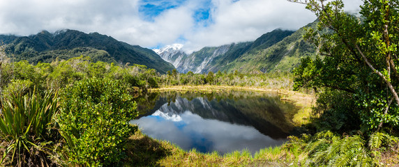 Panorama Mountain mirroring in lake New Zealand