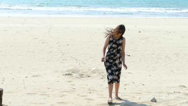 Tween girl at tropical beach