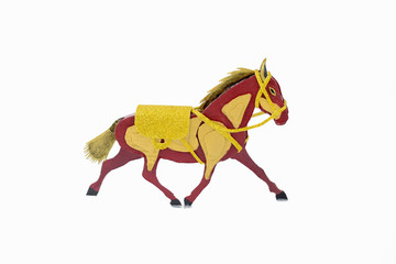 Decorated horse craft made of card-board cut out displayed on a white background