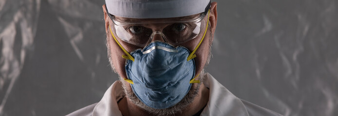  doctor of virology with a protective mask,coronavirus outbreak