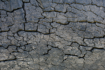 Black old tire rubber background texture with cracks