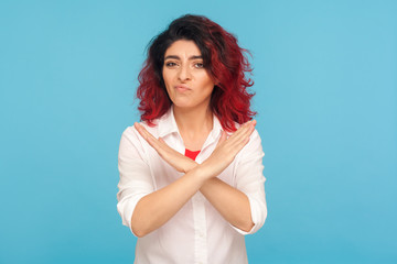 Never, no compromise! Portrait of dissatisfied hipster woman with fancy red hair crossing hands,...
