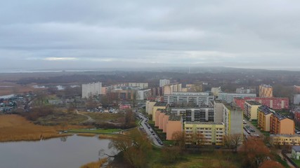 Fototapeta na wymiar Aerial photo of urban residential apartment buildings. Water and park.