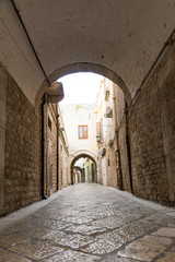 Small alley in Trani, Italy