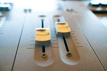 Music or light mixer desk in darkness. Dj mix club.