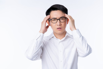 sick asian glasses male adult Headaches & Migraines hand touch head with stressful and tension white background health ideas concept