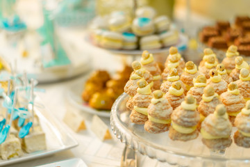 table setting with flowers and sweets